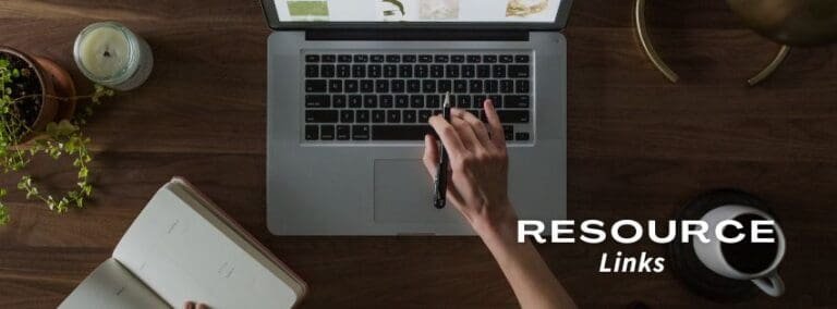 Someone working on a computer looking up ESL resources